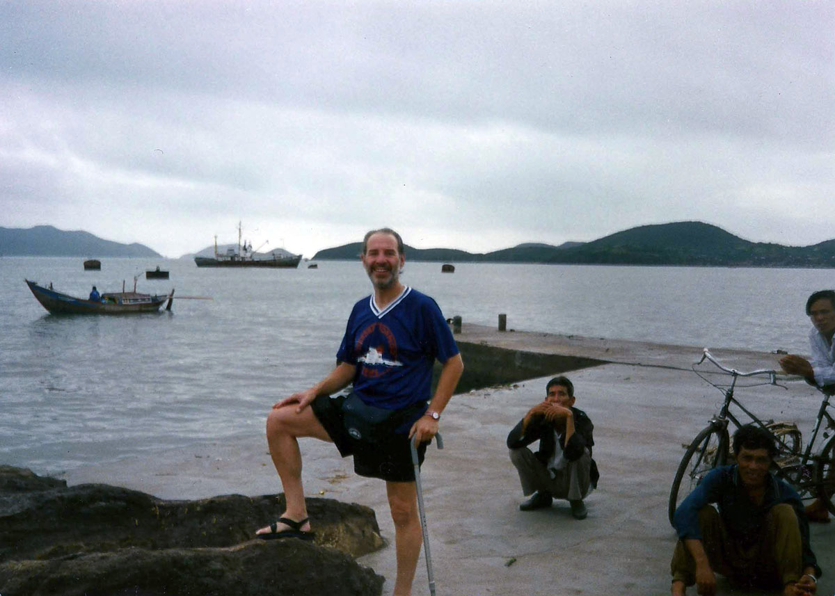 vietnam-z-with-locals-on-haunches-in-south-east